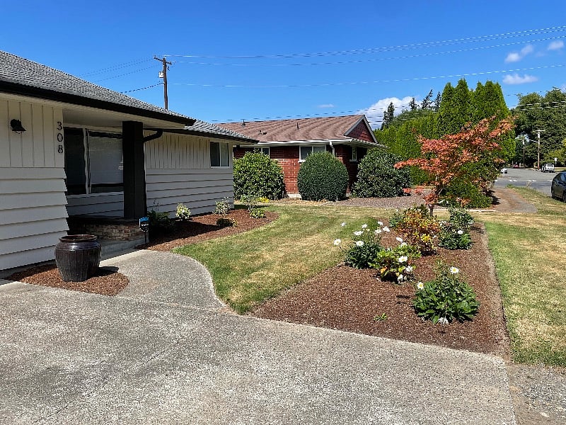 Newly landscaped front yard, lawn maintenance included!