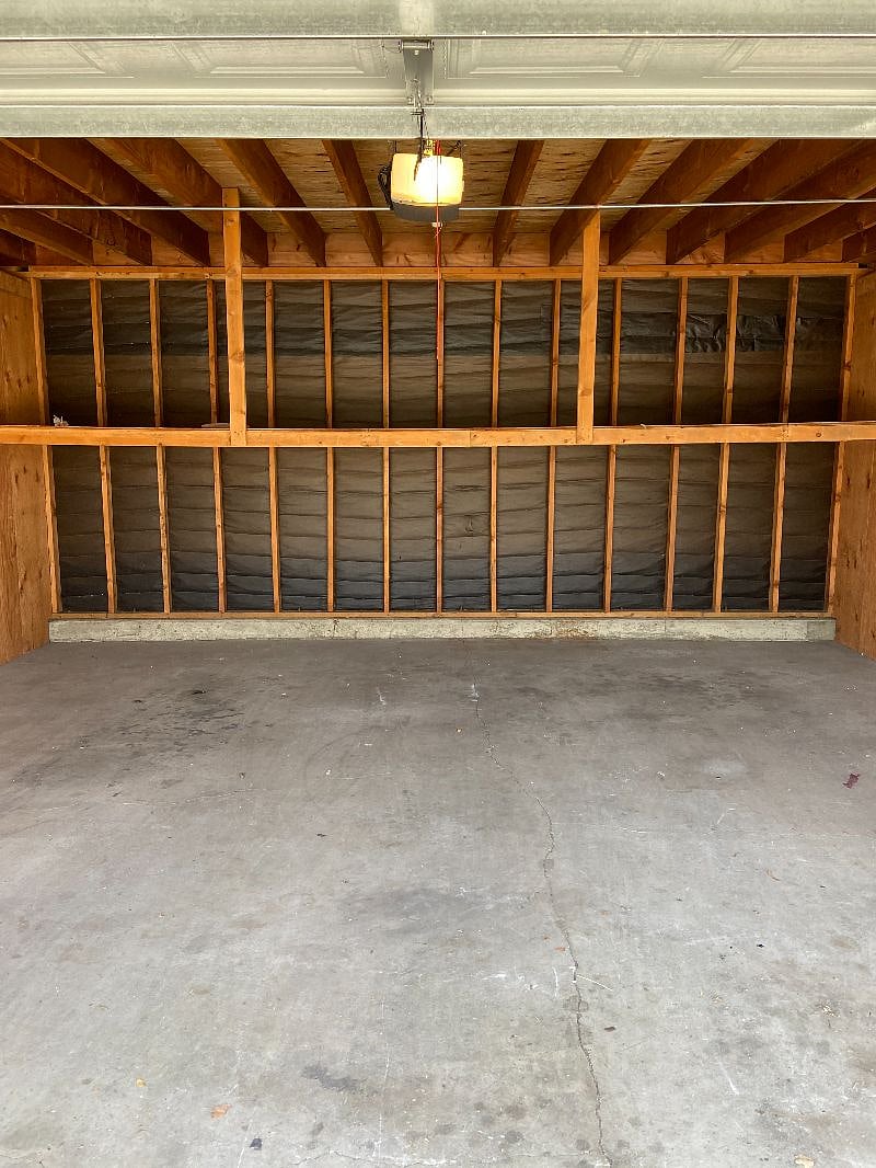 2 car garage with storage areas