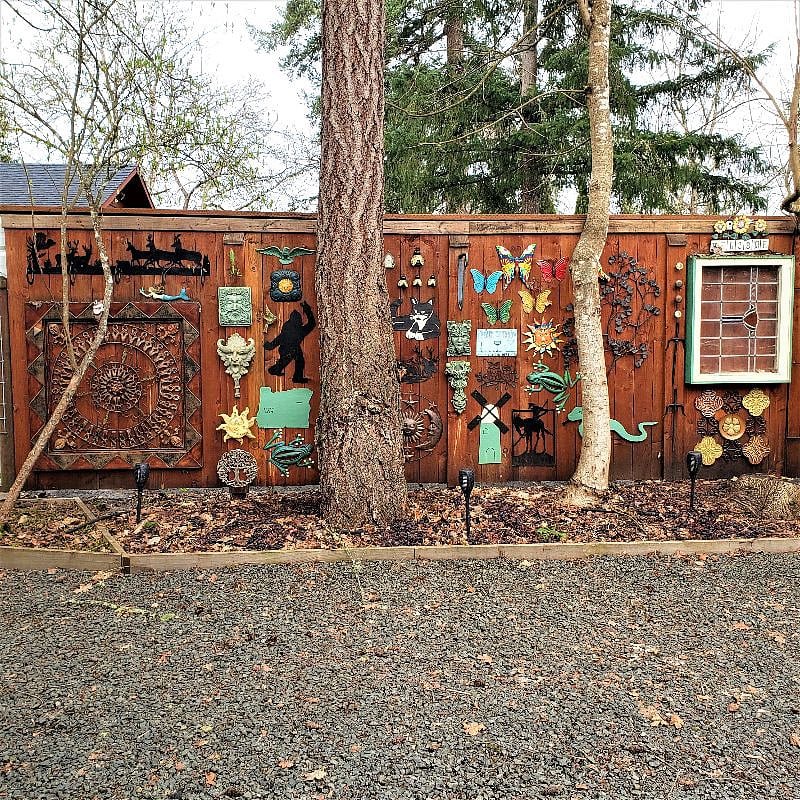 Fine Art Wall by primary parking space in front of cabin.