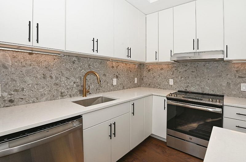 Full kitchen with range and dishwasher