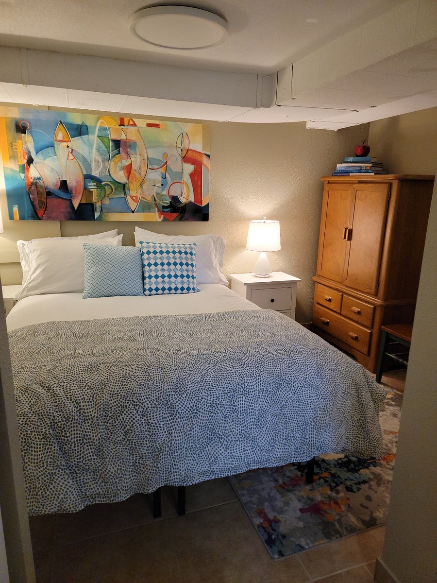 Lovely, comfortable queen bedroom with plenty of storage.