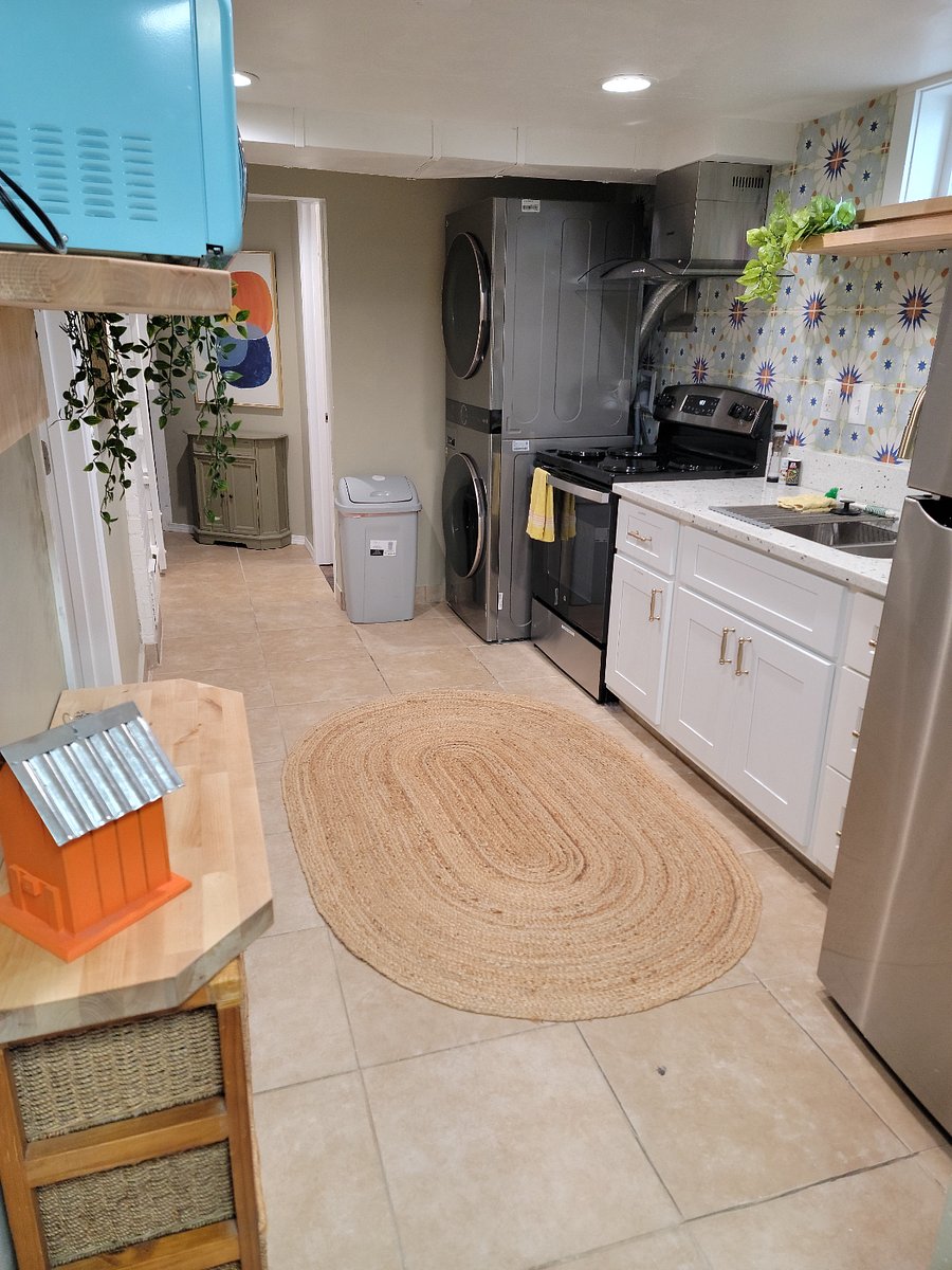 Kitchen featuring new full size washer and dryer