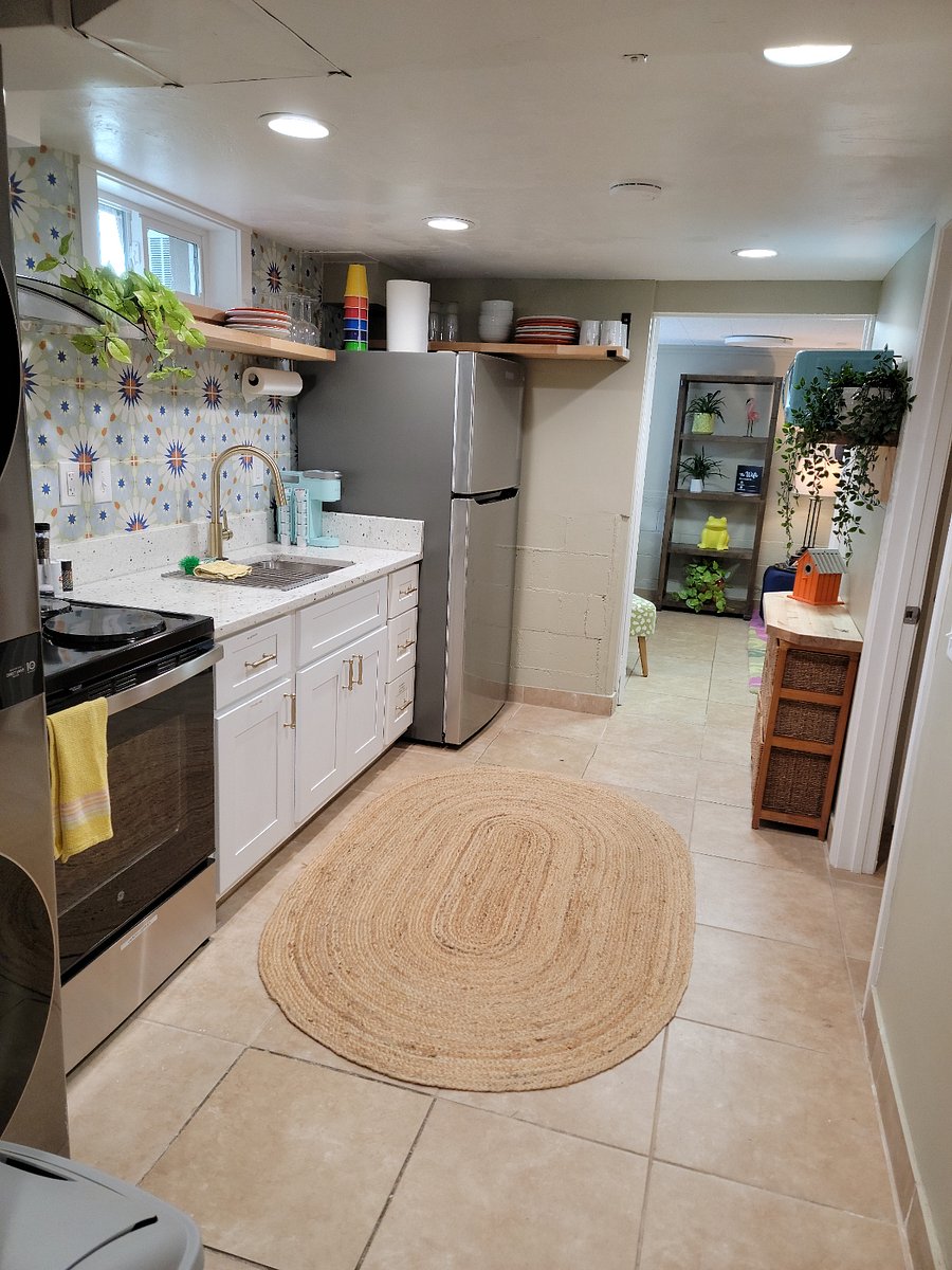 Kitchen featuring new full size appliances and tile floor
