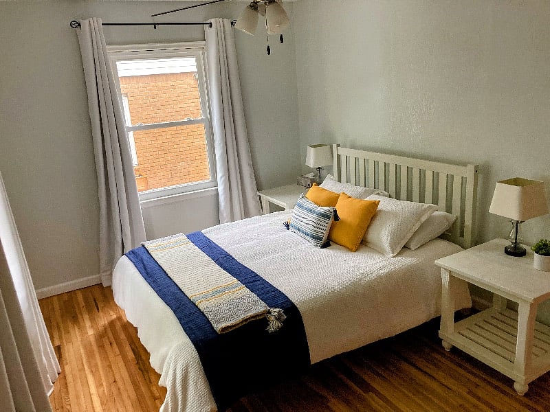 Black out curtains and Queen sized bed.