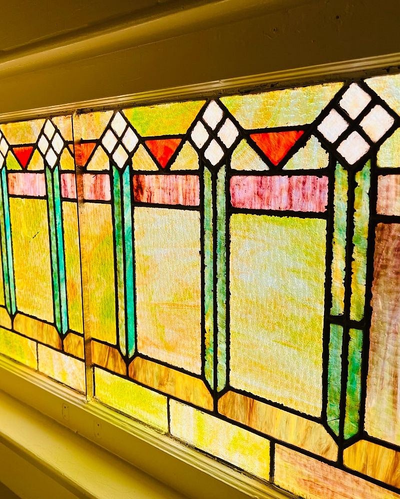 Original stained glass window on the first floor landing