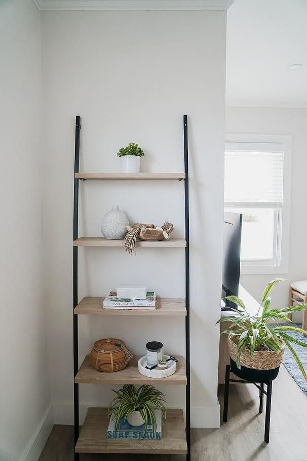This shelf can be swapped for a 38 inch desk and an office chair on wheels for work at home situations.