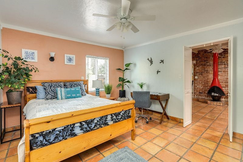 Master bedroom includes a super comfy queen bed, large closet, desk and private bathroom