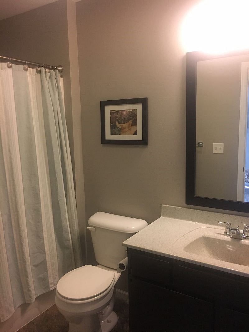 Bathroom with tub/shower on 2nd floor next to bedroom.