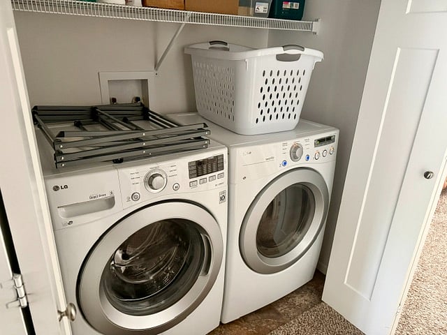 Washer and dryer on 2nd floor next to bedroom