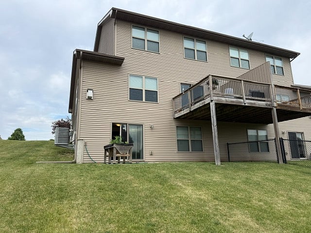 Large backyard with hill. No fence.