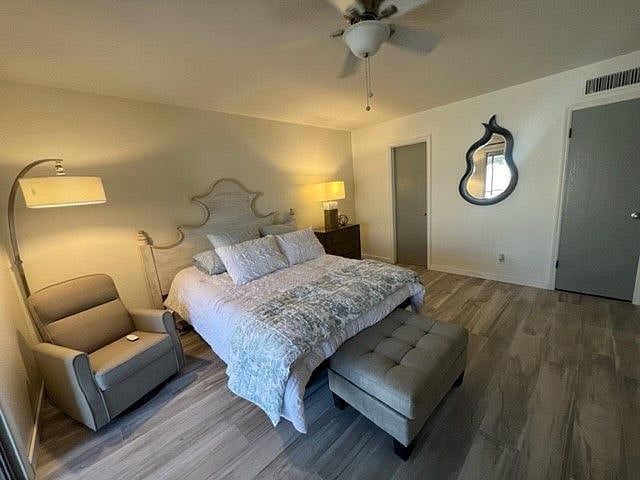 Master bedroom with remote adjustable Queen bed, with walk-in closet