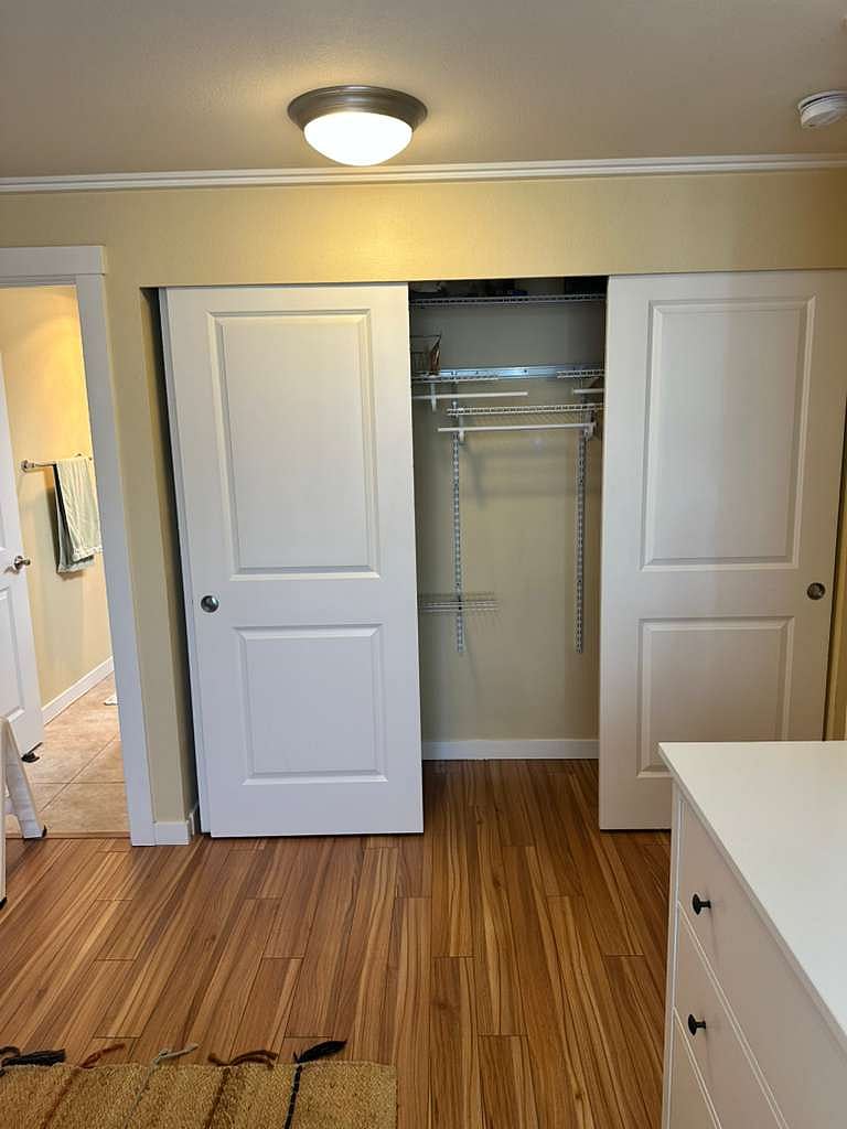 Huge closet in main bedroom, with door to en suite bathroom