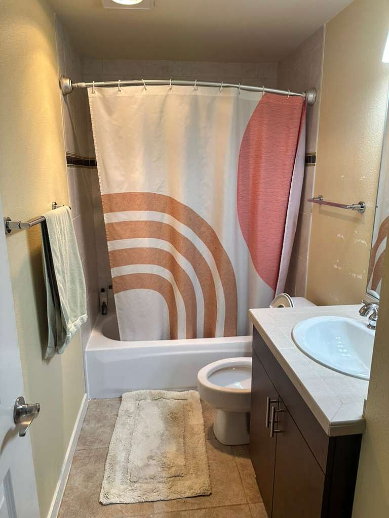 En suite bathroom (note: wall markings left from last tenant are being repaired)