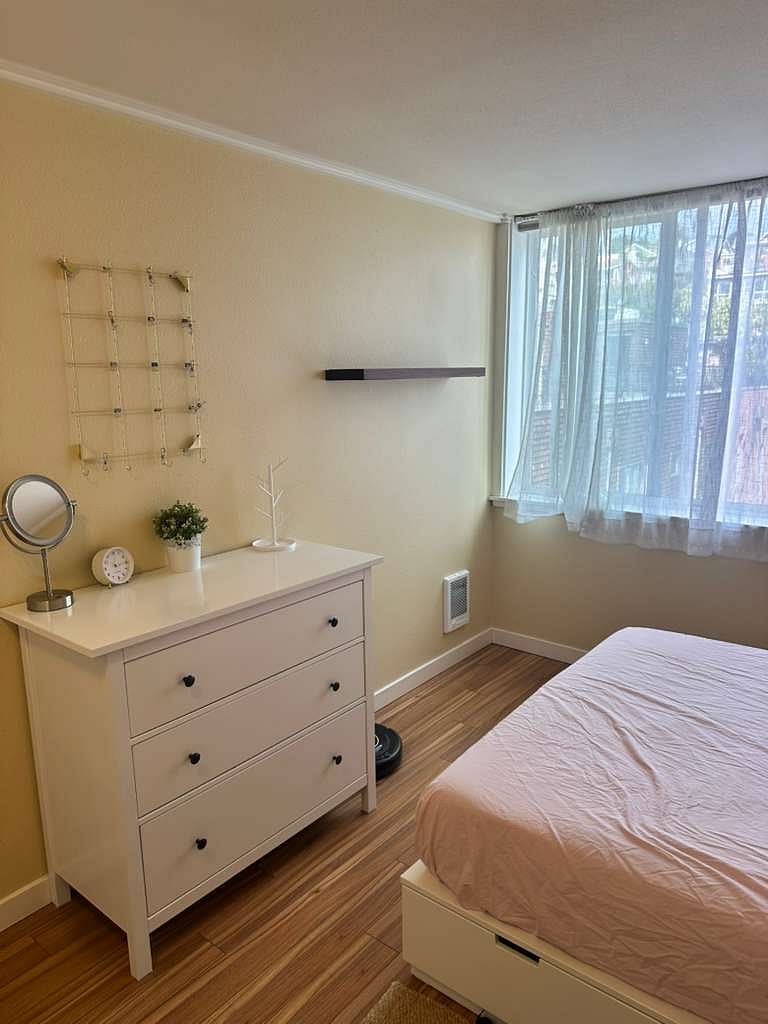 Main bedroom. Window has views of Queen Anne hill and remote controlled blackout shades