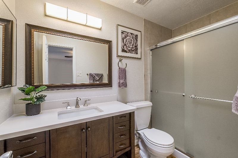 Newly 100% remodeled master bathroom with walk in shower.