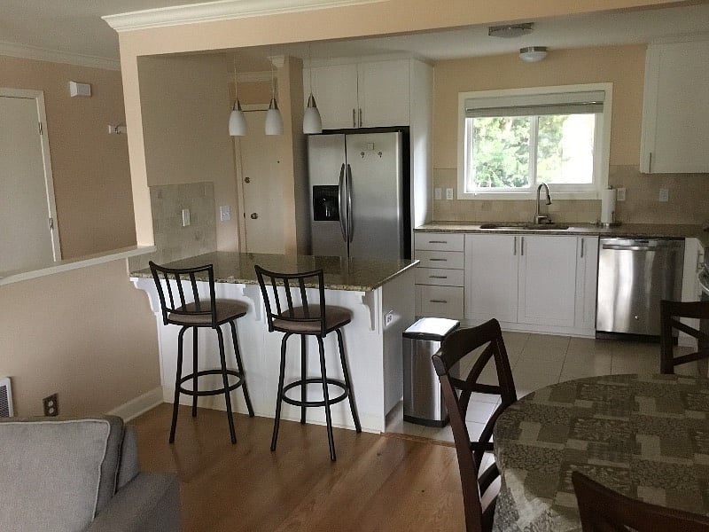 Kitchen area with a peninsula bar