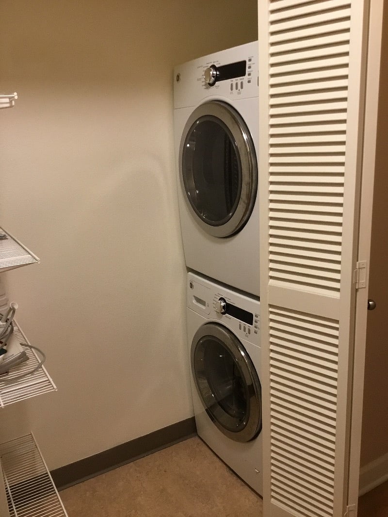 Laundry closet across from hall bathroom