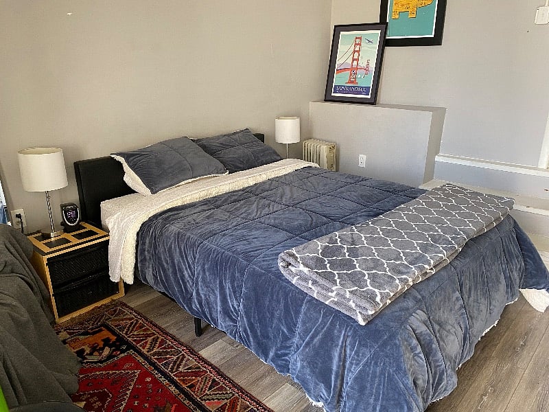 Bedroom 3 Large with plenty of storage and its own entrance looking out to the deck and garden.