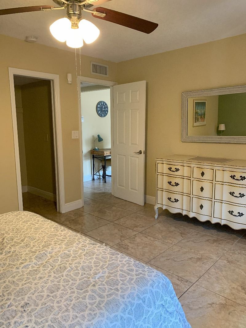 Main bedroom dresser and closet.