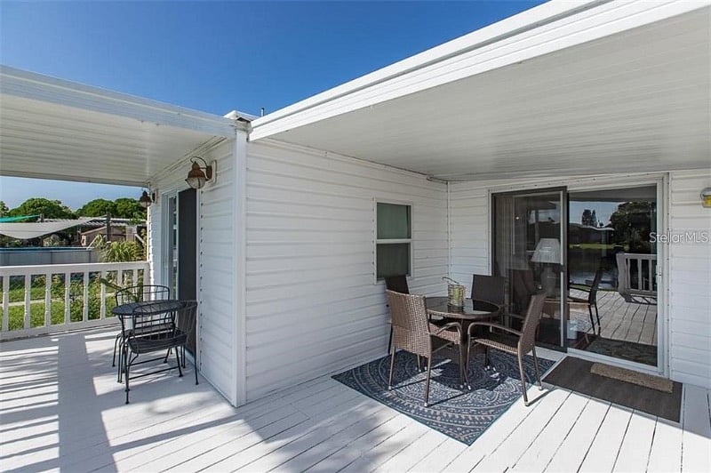 Covered dining patio facing Canal water view