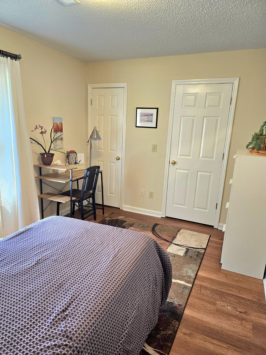 Twin Xl bed, large walk in closet and work area