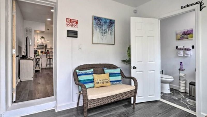 INVITING WELCOMING ENCLOSED FRONT PORCH