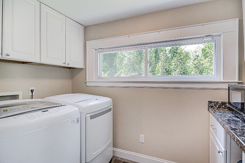Laundry Room | Washer and Dryer conveniently located in a shared space with the kitchen pantry.