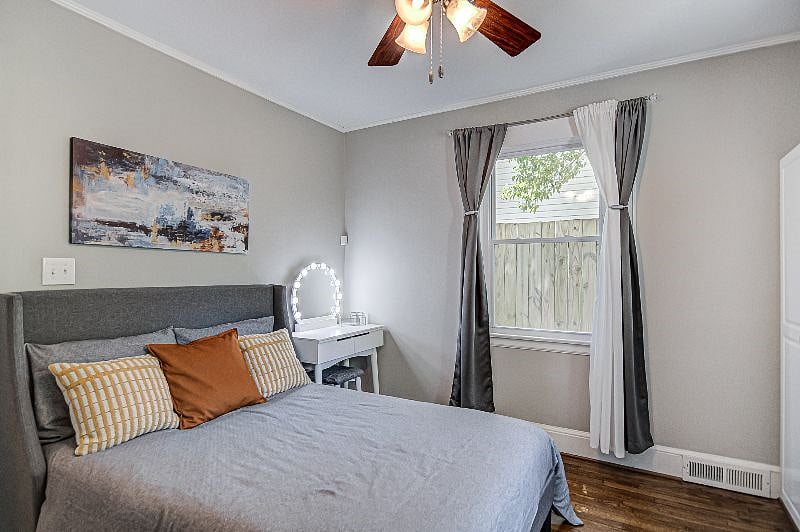 Sunset Bedroom | Bed has a plush mattress. Lighted vanity with drawers.