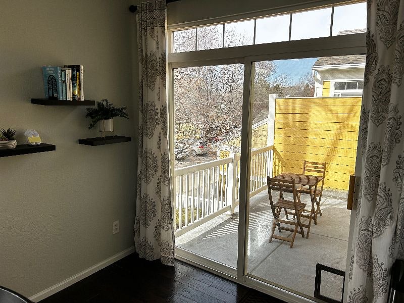 Sliding glass doors to private balcony