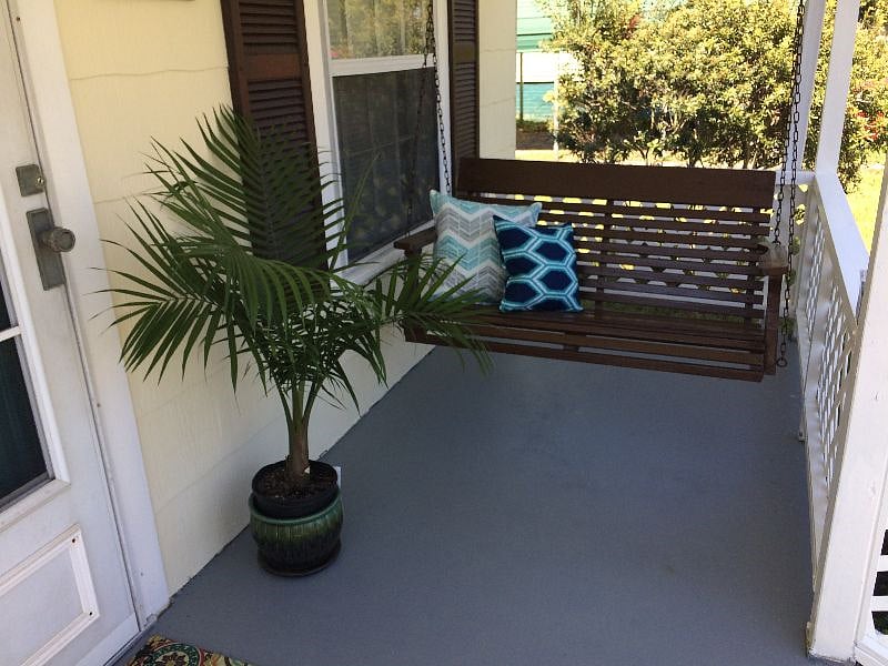 Cozy porch awaits you as you come and go to work. From the custom made House Sign, swing, bistro table, maybe a plant if in season, live Ring camera access. you will enjoy your daily routine zipping in and out of this Little Gem.
