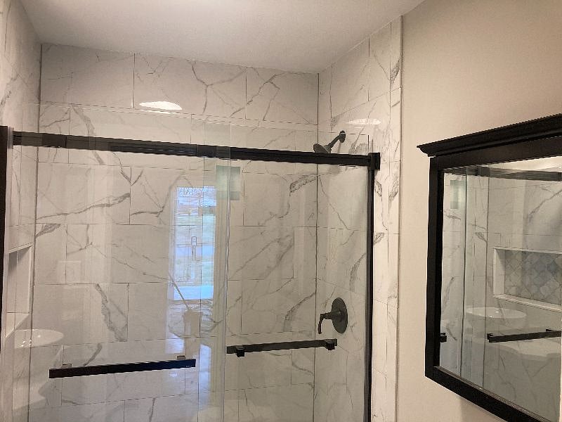Glass shower door and new antique bronze hardware