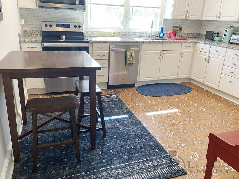 The blue oval braided rug was the very last one hand-made by an adorable lady in Dallas who finally retired in her 90's from weaving these oval rugs.