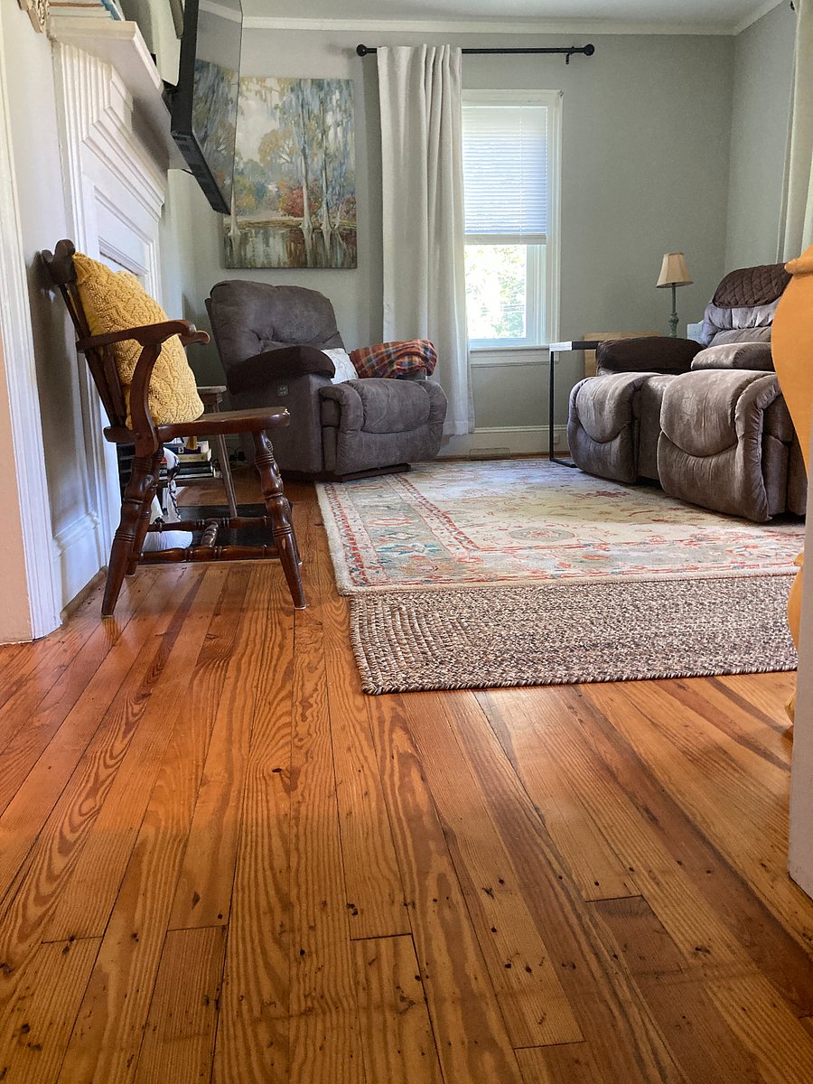 Beautifully restored heart pine vintage flooring.