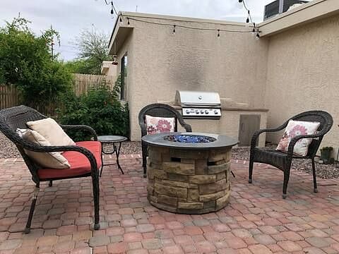 patio with BBQ and fire pit