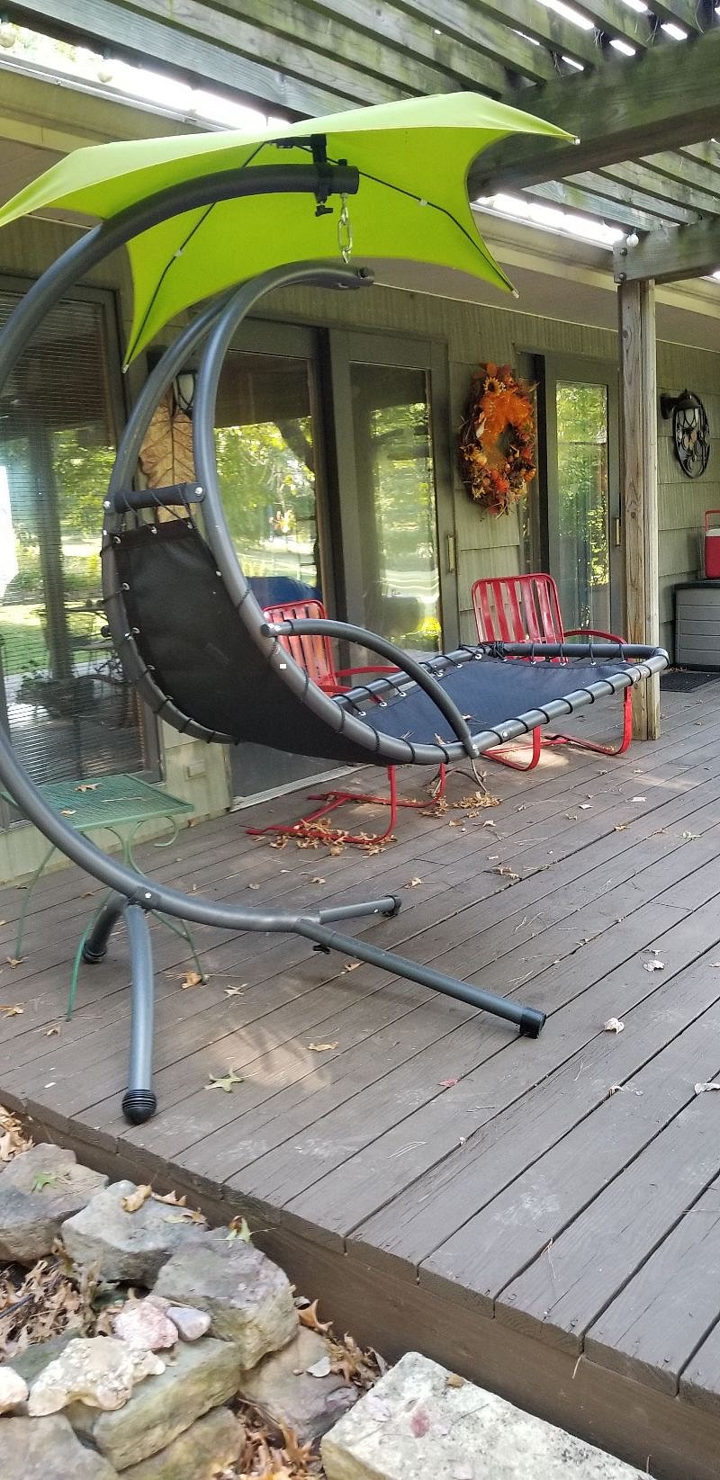 Swinging deck chair.