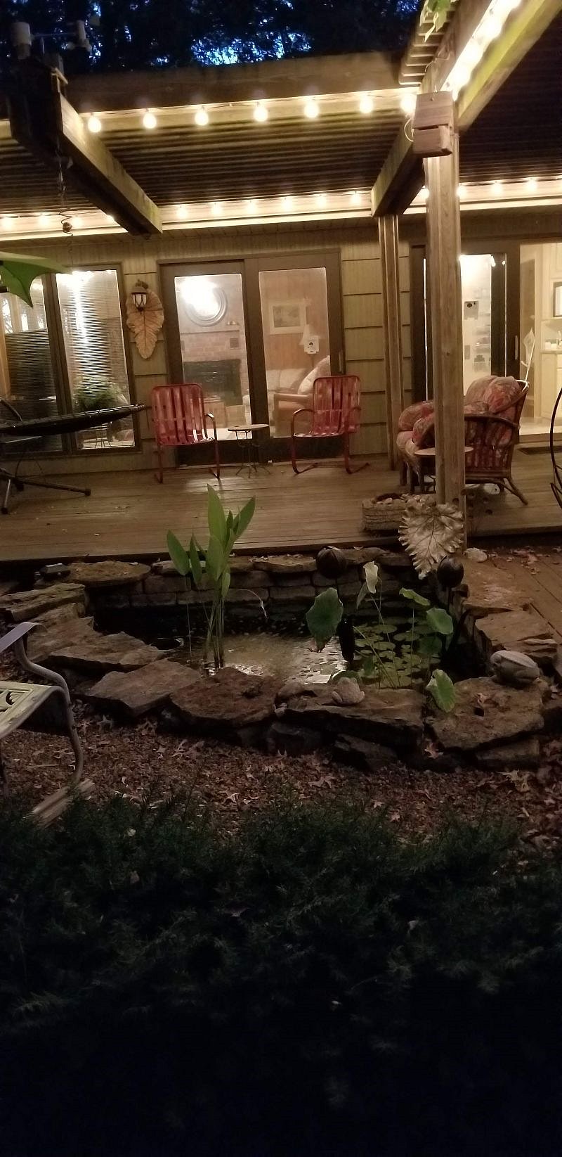 Koi pond by deck