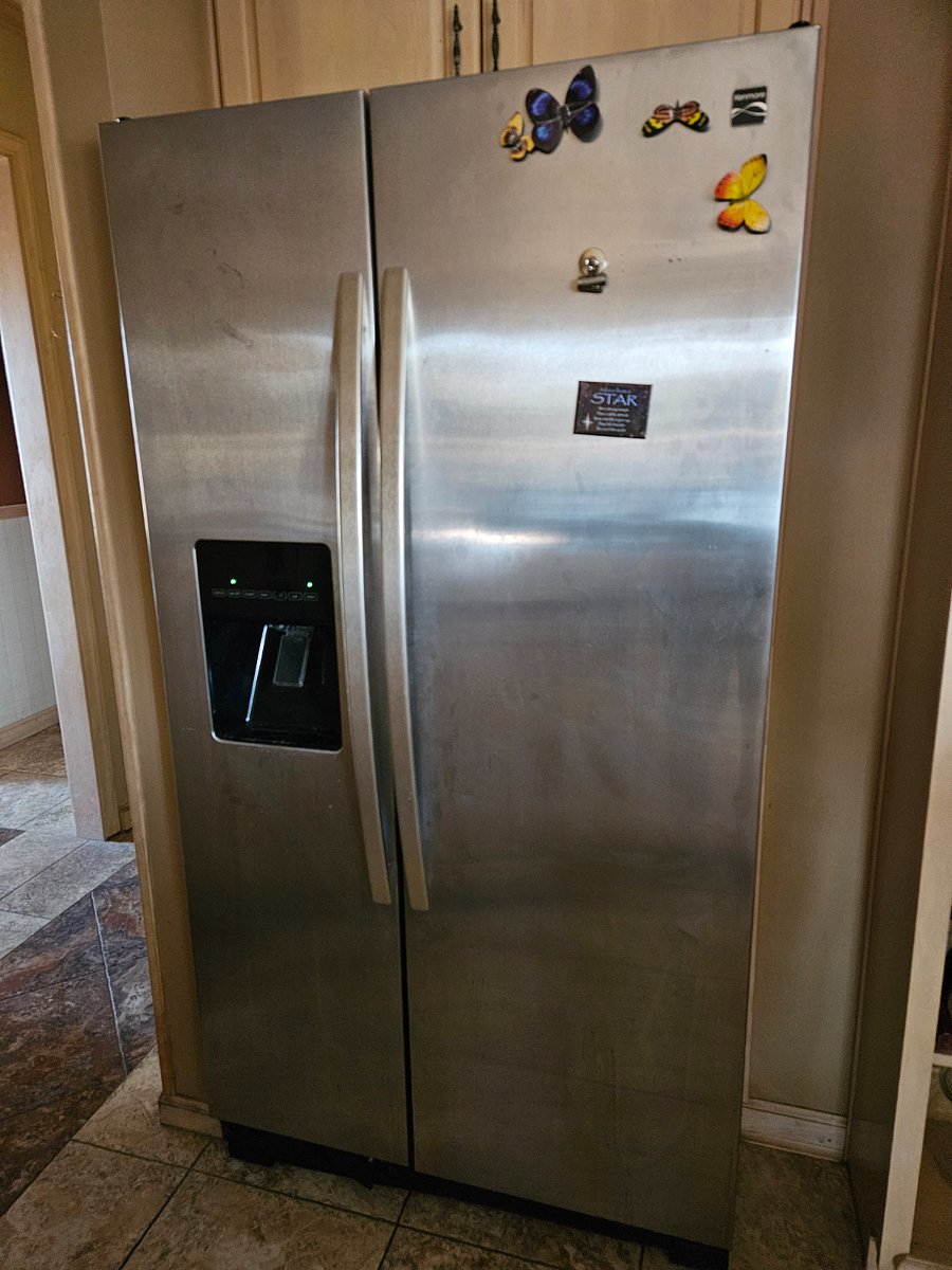 Kenmore refrigerator with icemaker.