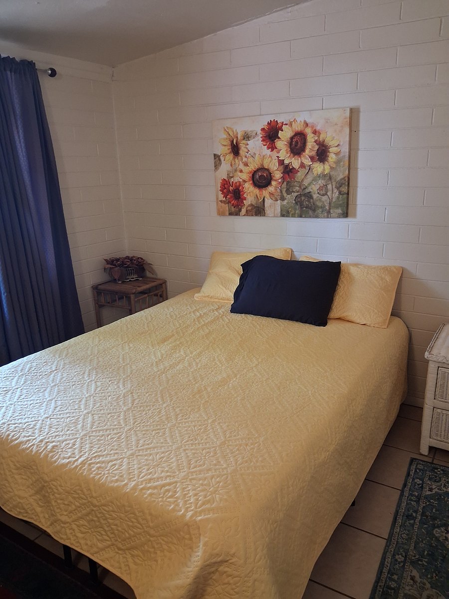 Primary bedroom comfy new bedding and has its own bathroom