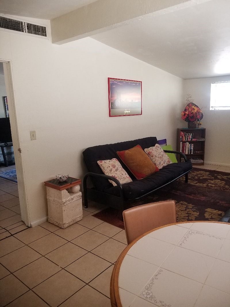Den with futon great room to hangout in