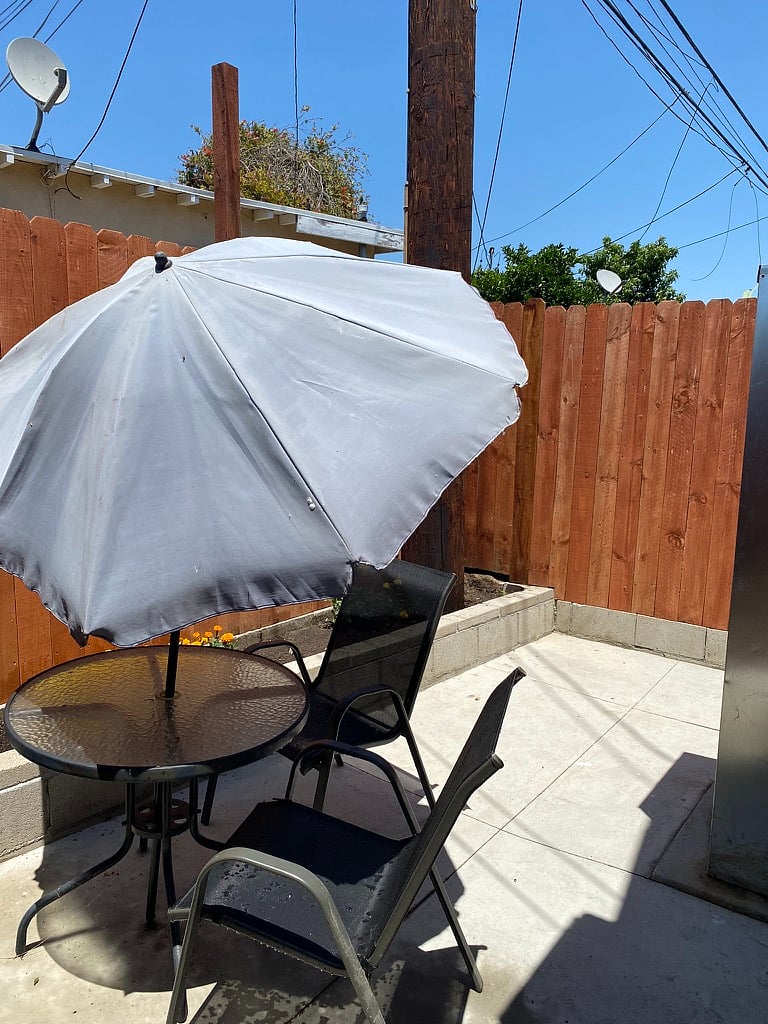 Enclosed Patio with Table and Chairs