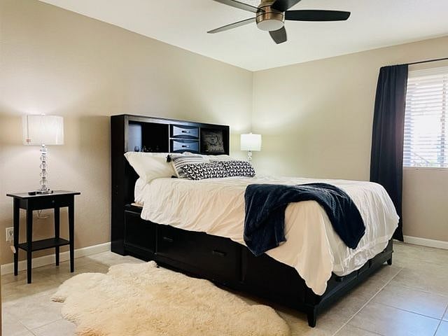 Bedroom two with queen and under gram storage and huge walk in closet with private full bath