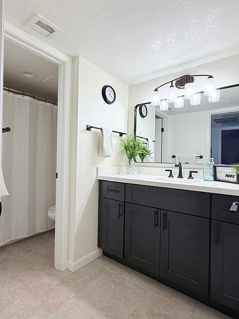 Bathroom 1 Privacy door to shower/commode