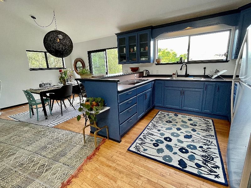 Full kitchen with new stovetop and countertop oven