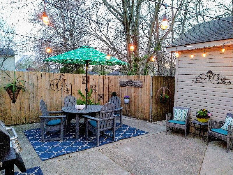 Outdoor dining with fresh herbs on table