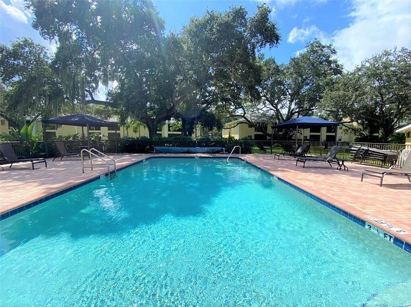 Main pool which is closest to our unit and heated in the winter months. 3 cabanas for shade and restrooms. 2 minute walk.