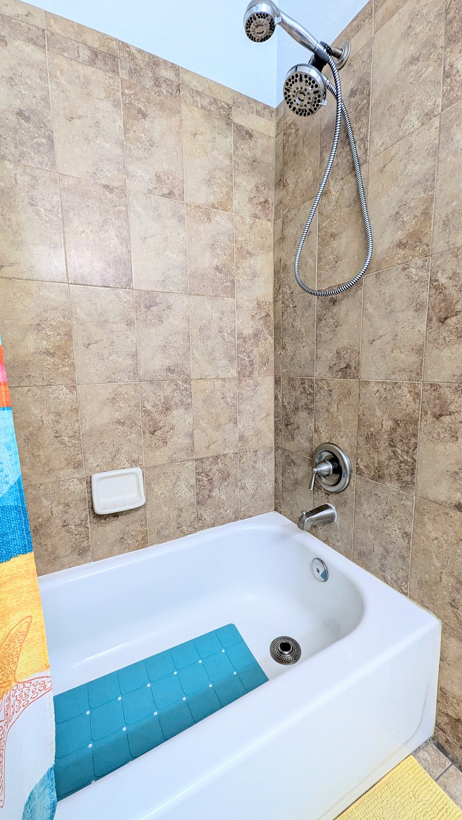 New shower heads and valve installed by plumber in 2025