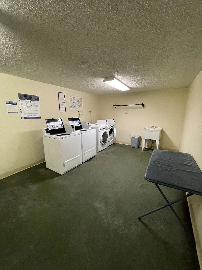 Laundry room directly across the hallway and included with rent