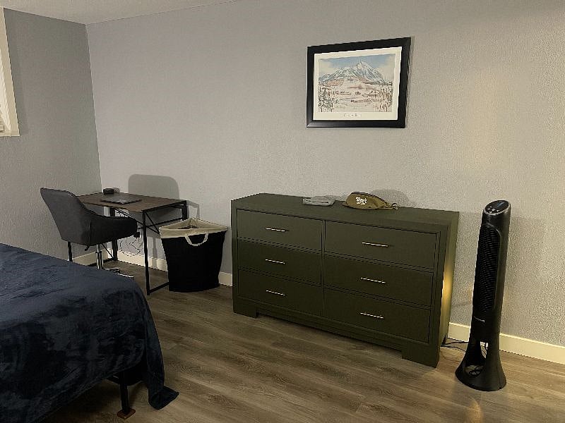 Desk and dresser in master bedroom