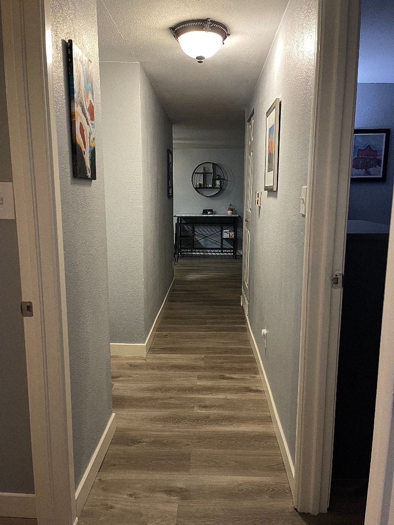 Hallway from bedrooms into living room