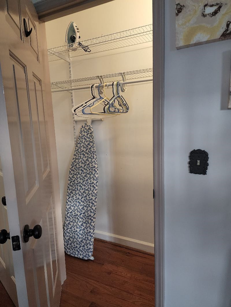 Spacious closets with full ironing board.